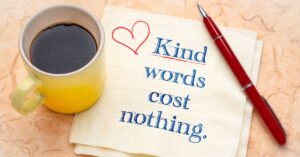 Kind words cost nothing with a heart doodled in red ink