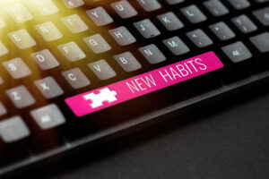 A keyboard with "New Habits" as the spacebar.