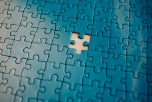 Puzzle with missing piece.