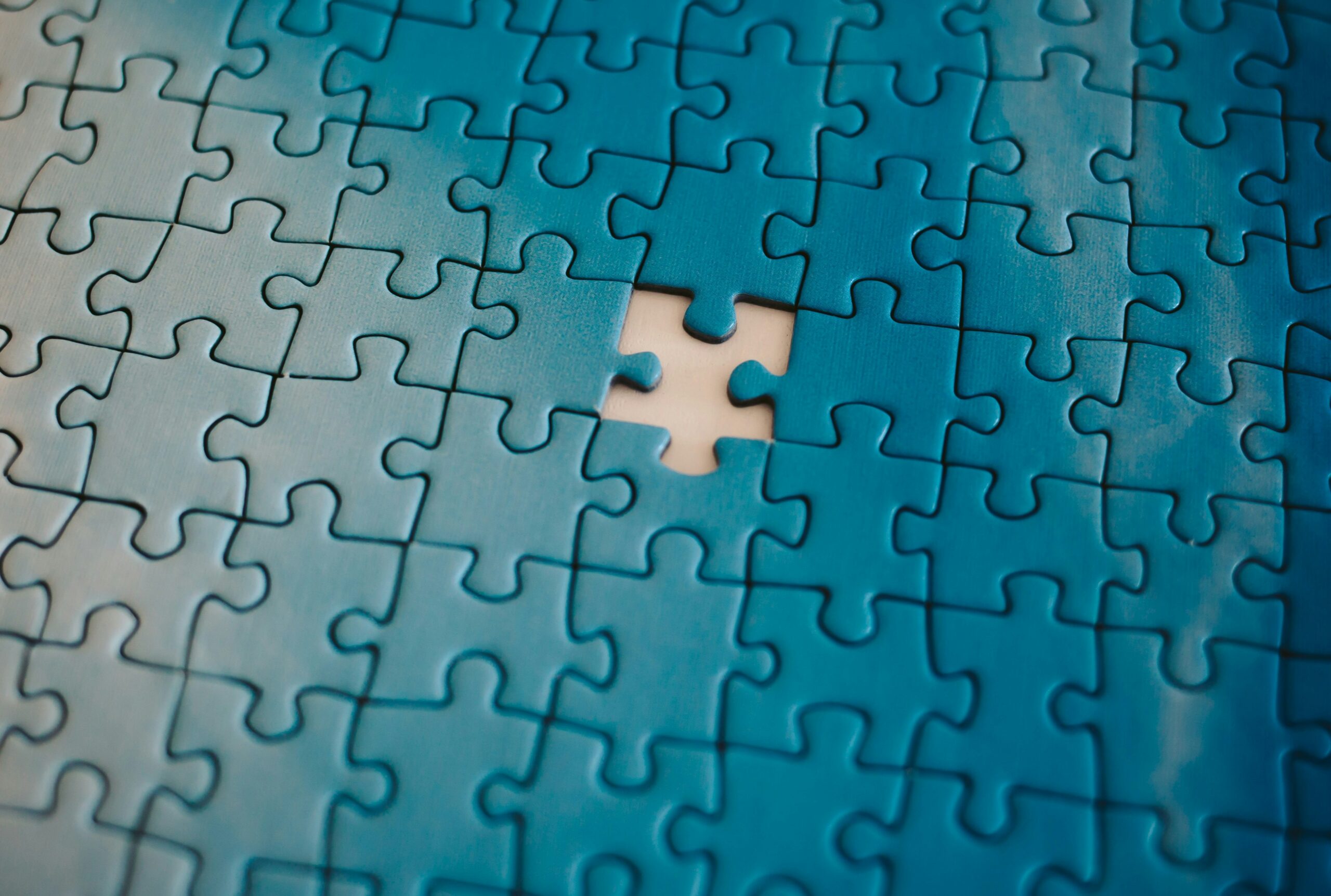 Puzzle with missing piece.