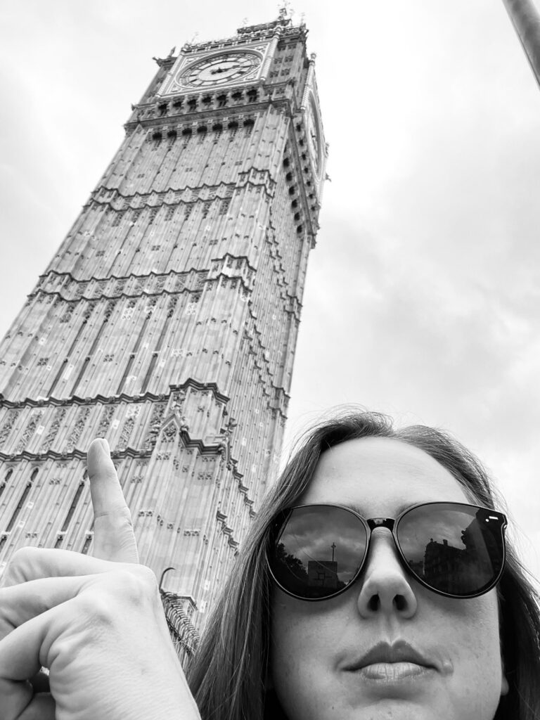 L.A. Mitchell in front of the Elizabeth Tower at the Palace of Westminster in London